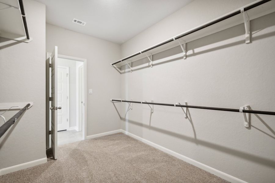 Walk-in closet in the Fitzhugh floorplan in a Meritage Homes community.