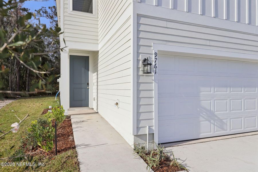 Exterior details and patio area of a home in Cypress Meadows - The Villas, Jacksonville (Image 23).