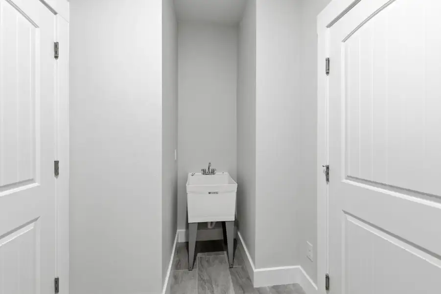 Furnished interior view inside a new home in Lonesome Dove, San Antonio (Image 31).