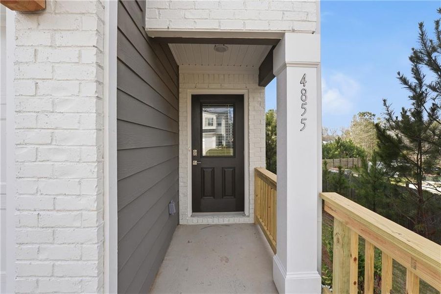 Exterior details and patio area of a home in The Enclave at Stonewall Station, Union City (Image 17).