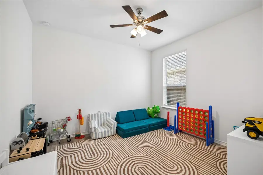 Versatile bedroom ideal for guests, children, or hobbies.