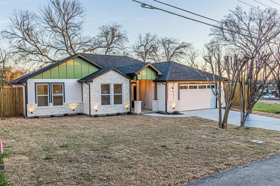 Front exterior of a new home in , Dallas, TX, highlighting curb appeal (Image 1). Front exterior of a new home in , Dallas, TX, highlighting curb appeal (Image 1).