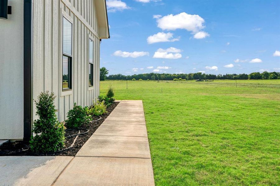 Front exterior of a new home in , Paris, TX, highlighting curb appeal (Image 1). Front exterior of a new home in , Paris, TX, highlighting curb appeal (Image 1).