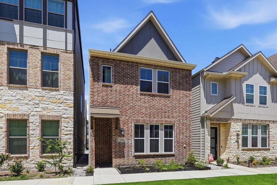 Front exterior of a new home in Tenison Village, Dallas, TX, highlighting curb appeal (Image 2). Front exterior of a new home in Tenison Village, Dallas, TX, highlighting curb appeal (Image 2).