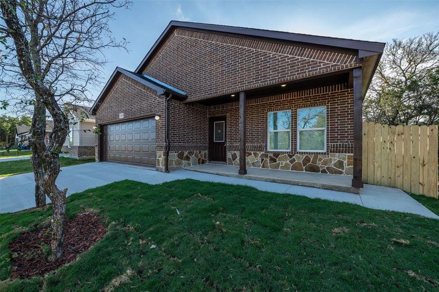 Front exterior of a new home in , Granbury, TX, highlighting curb appeal (Image 11). Front exterior of a new home in , Granbury, TX, highlighting curb appeal (Image 11).
