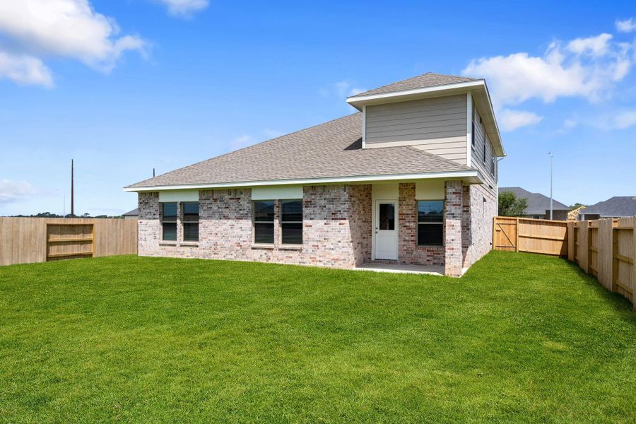 Front exterior of a new home in , New Caney, TX, highlighting curb appeal (Image 1).