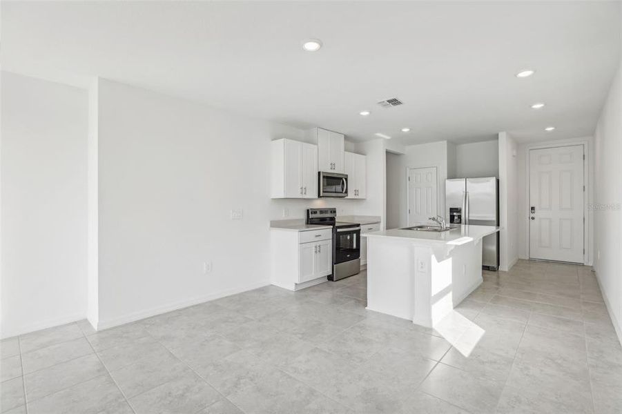 Furnished interior view inside a new home in Lake Deer Estates - Classic Series, Poinciana (Image 10).