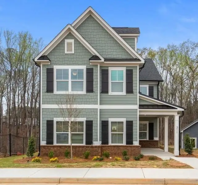 Front exterior of a new home in , Athens, GA, highlighting curb appeal (Image 1). Front exterior of a new home in , Athens, GA, highlighting curb appeal (Image 1).