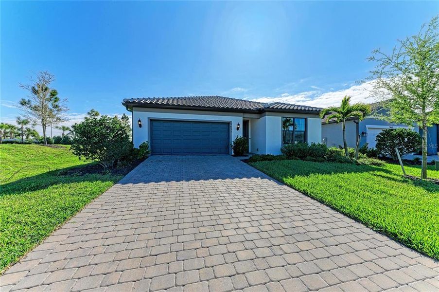 Front exterior of a new home in , Bradenton, FL, highlighting curb appeal (Image 25). Front exterior of a new home in , Bradenton, FL, highlighting curb appeal (Image 25).