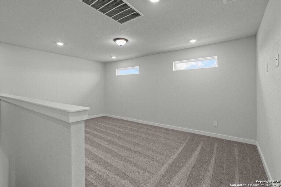 Spacious, unfurnished interior of a new home in August Fields, New Braunfels (Image 21).