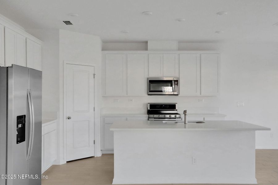 Furnished interior view inside a new home in Cordova Palms, St. Augustine (Image 7).