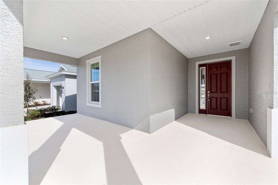 Exterior details and patio area of a home in Calesa Township, Ocala (Image 3).