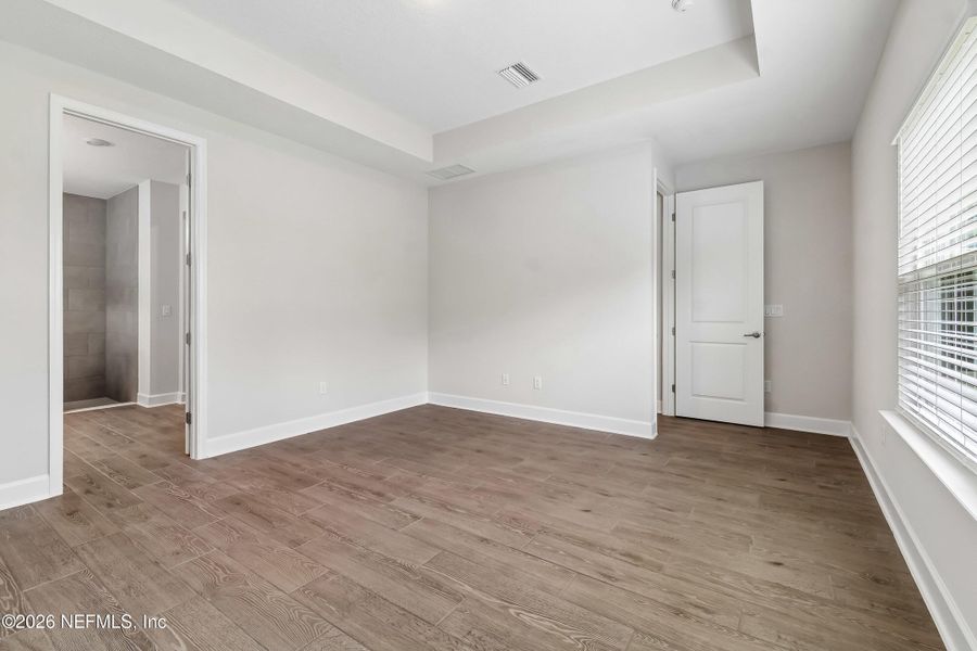 Spacious, unfurnished interior of a new home in Tributary 50', Yulee (Image 22). Spacious, unfurnished interior of a new home in Tributary 50', Yulee (Image 22).