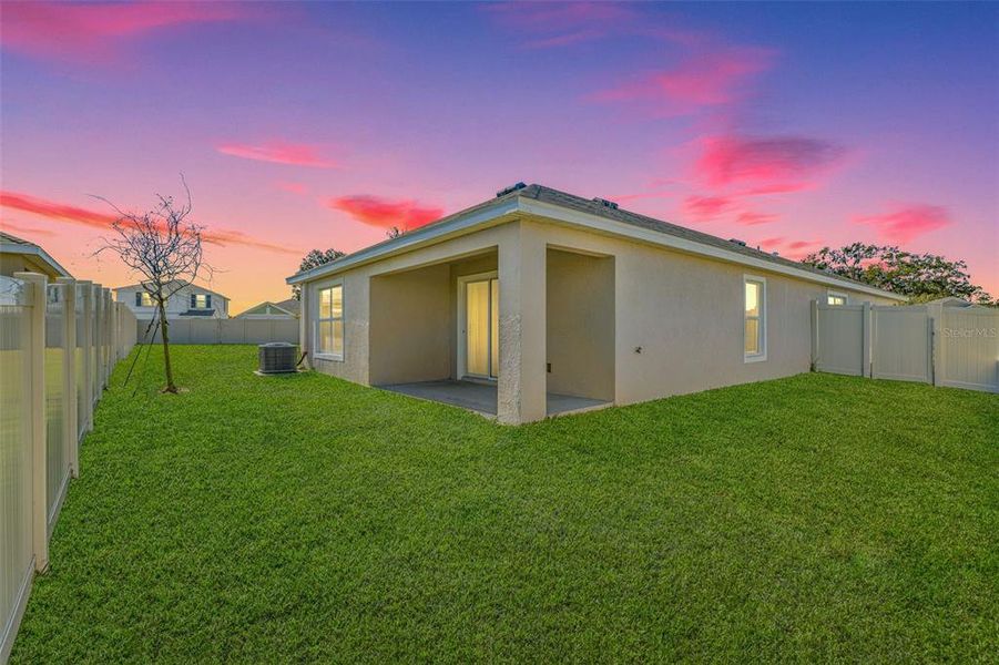 Exterior details and patio area of a home in , Dade City (Image 4).