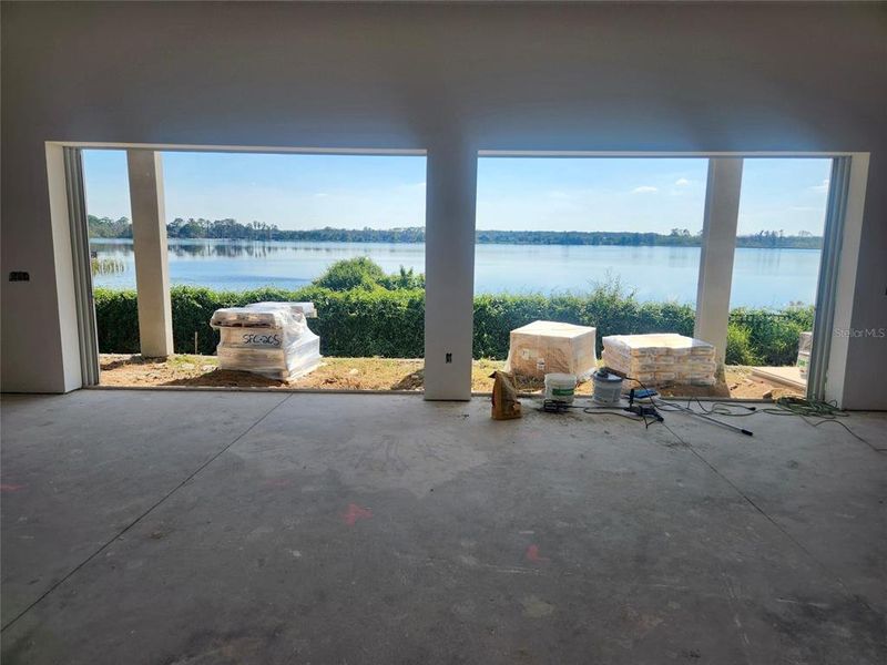 In-progress construction of a new home in Shorefront Cove, Winter Garden, FL (Image 5).