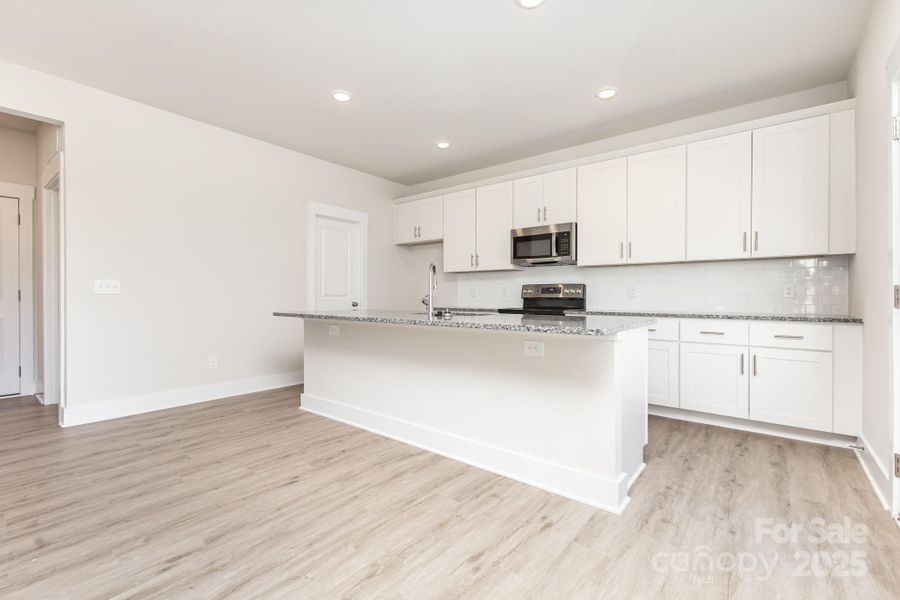 Furnished interior view inside a new home in , Mooresville (Image 5).