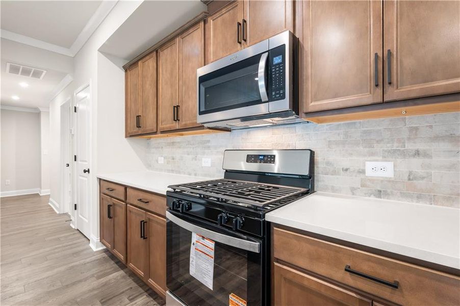 Furnished interior view inside a new home in Cambridge at Steels Bridge: Steels Bridge, Canton (Image 6). Furnished interior view inside a new home in Cambridge at Steels Bridge: Steels Bridge, Canton (Image 6).
