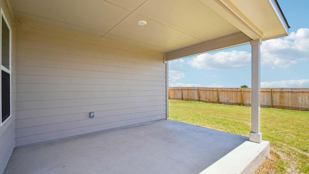 Exterior details and patio area of a home in Carillon, Manor (Image 2).