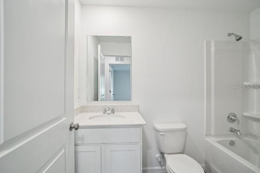 Furnished interior view inside a new home in Royal Highlands, Weeki Wachee (Image 9).