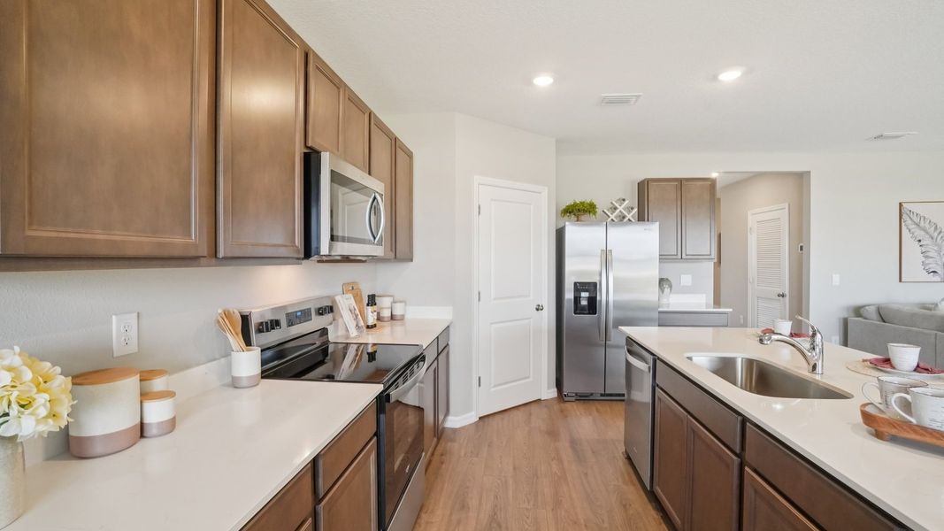 Representative furnished interior of a home built from the Madison by D.R. Horton in Summit View, Dade City (Image 14).