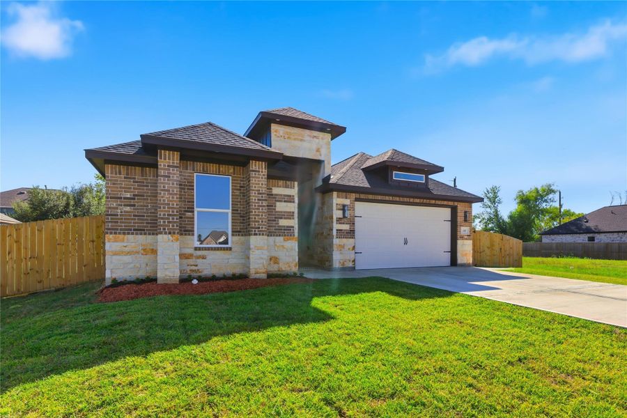 Front exterior of a new home in , Arcola, TX, highlighting curb appeal (Image 2).