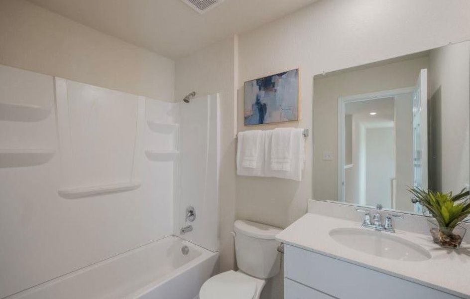 Furnished interior view inside a new home in The Pines At Seven Coves, Conroe (Image 9). Furnished interior view inside a new home in The Pines At Seven Coves, Conroe (Image 9).