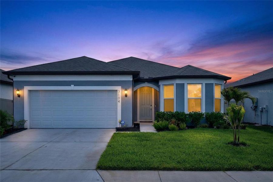 Front exterior of a new home in , Ellenton, FL, highlighting curb appeal (Image 32).