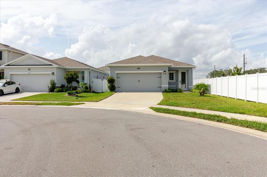 Front exterior of a new home in Conner Crossing, Spring Hill, FL, highlighting curb appeal (Image 24).