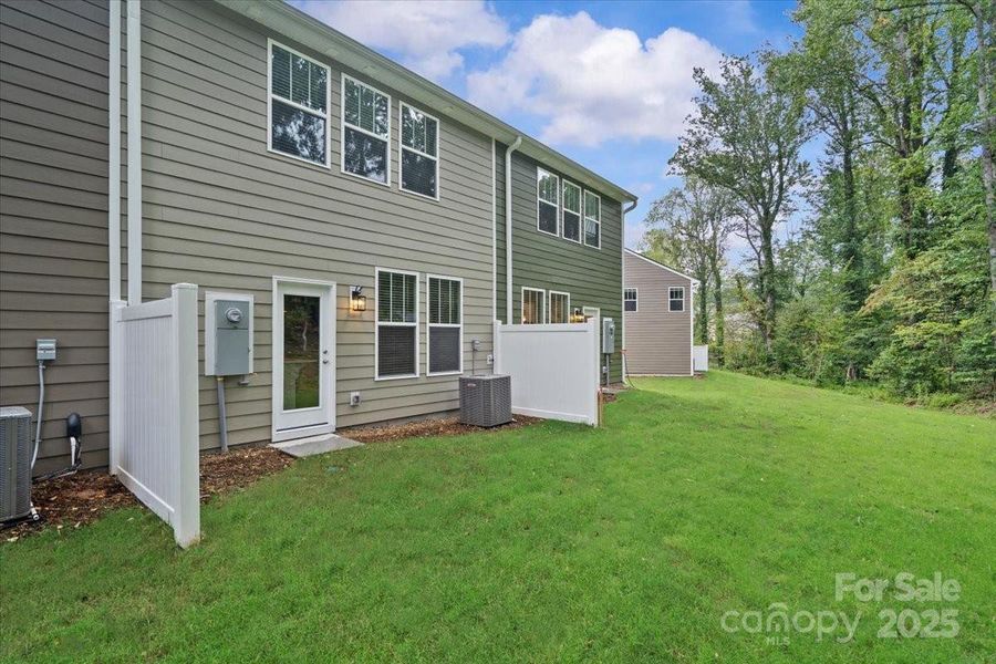 Exterior details and patio area of a home in Clayton Crossing, Arden (Image 4). Exterior details and patio area of a home in Clayton Crossing, Arden (Image 4).