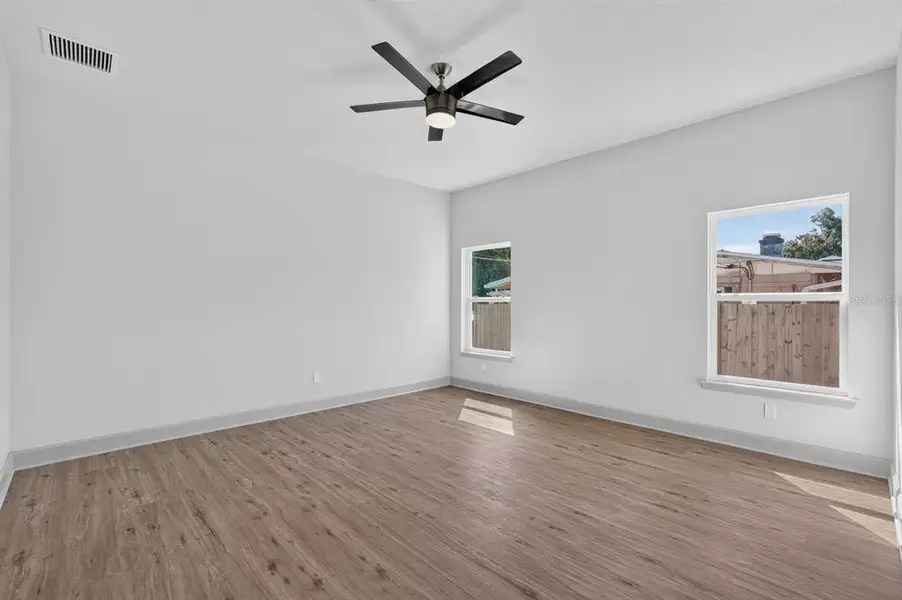 Spacious, unfurnished interior of a new home in , New Smyrna Beach (Image 14).
