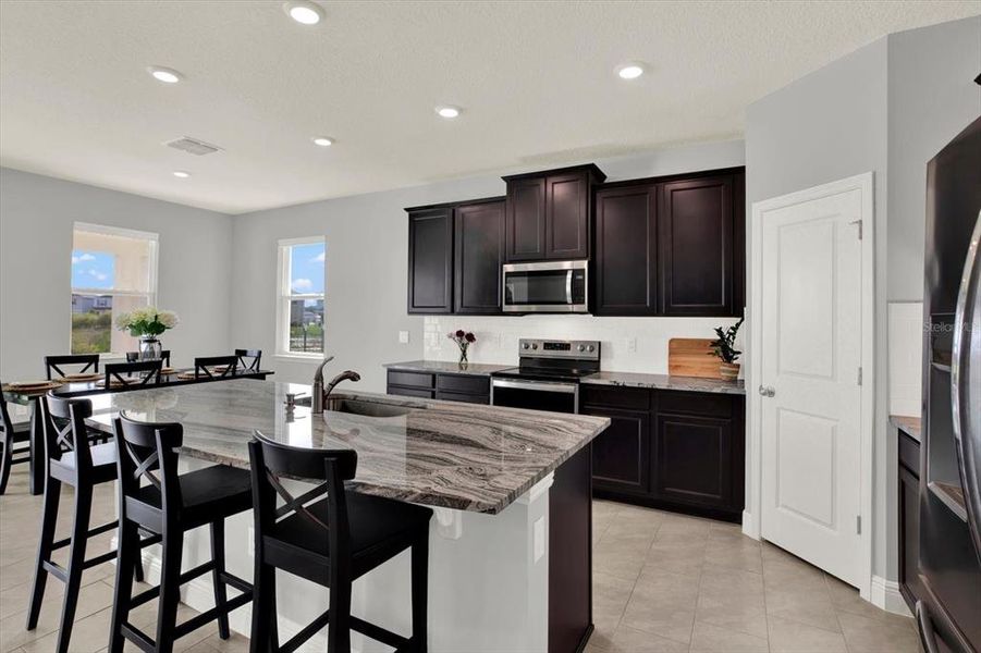 Furnished interior view inside a new home in Woodcreek, Wesley Chapel (Image 14).