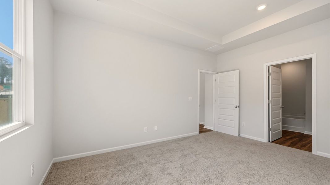 Spacious, unfurnished interior of a new home in The Reserve at Calcutta, Stockbridge (Image 25).