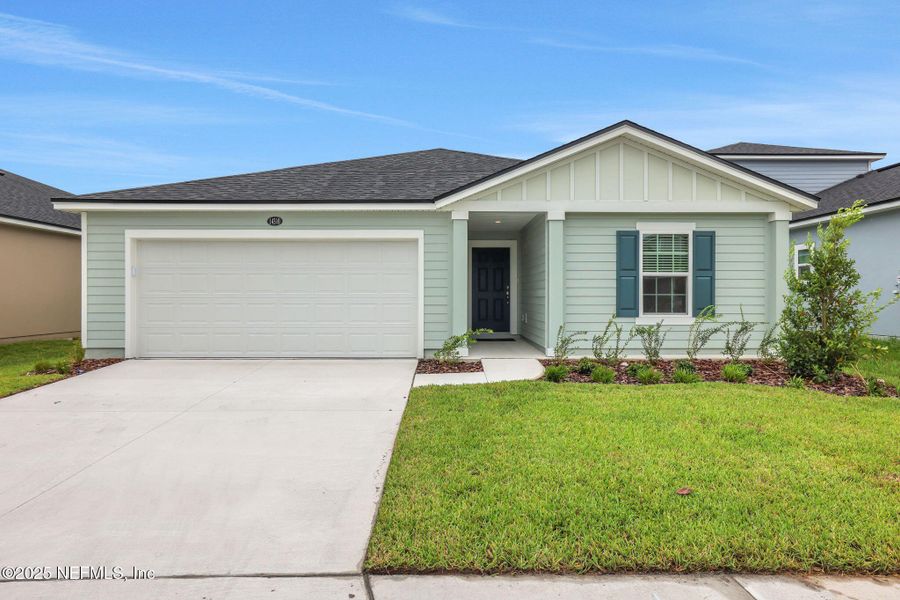 Front exterior of a new home in Bellbrooke, Jacksonville, FL, highlighting curb appeal (Image 4).