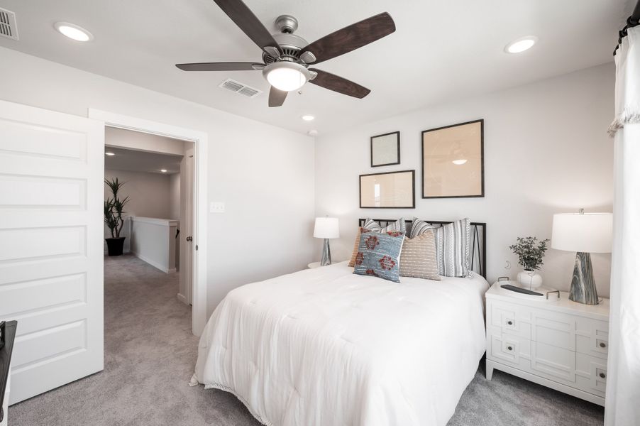 Representative furnished interior of a home built from the Yellowstar by Tri Pointe Homes in Mason Woods, Cypress (Image 10).