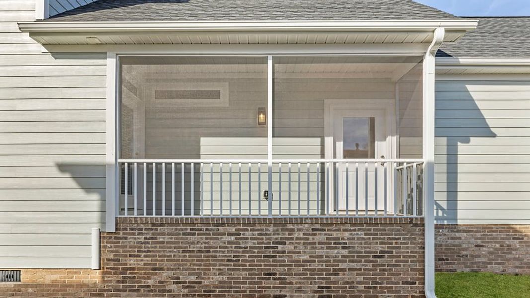 Exterior details and patio area of a home in Sunset Summits, Spartanburg (Image 3).