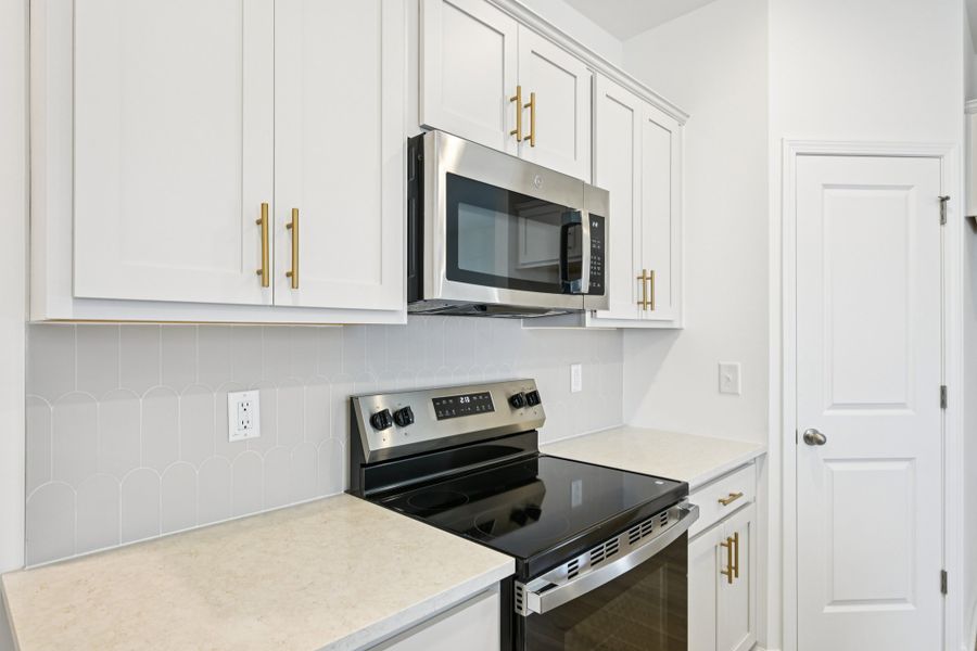 Representative furnished interior of a home built from the Grove by Ashton Woods in Middleton Farms, Middlesex (Image 7).