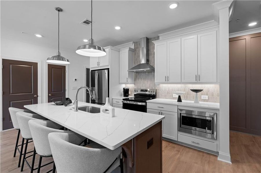 Furnished interior view inside a new home in Market Square at Sawnee Village, Cumming (Image 5).