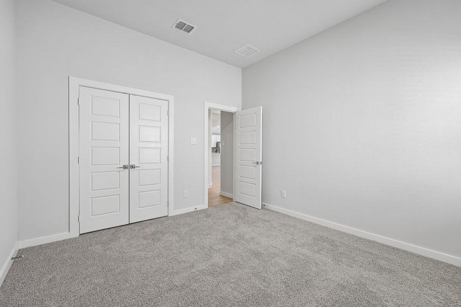 Bedroom in the Gilmour II home plan by Trophy Signature Homes