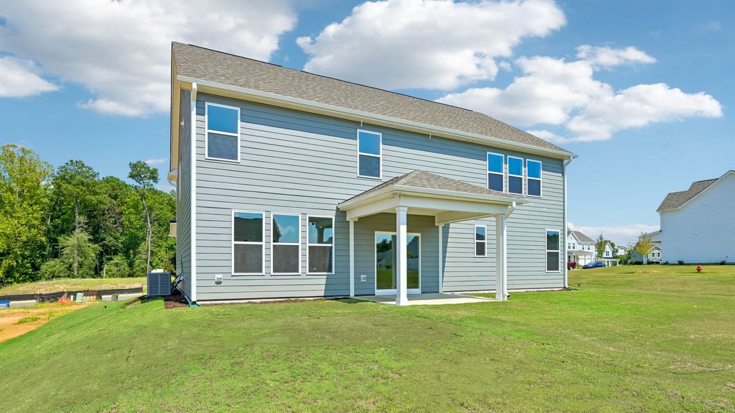 Exterior details and patio area of a home in Eagle Creek, Fuquay Varina (Image 20).