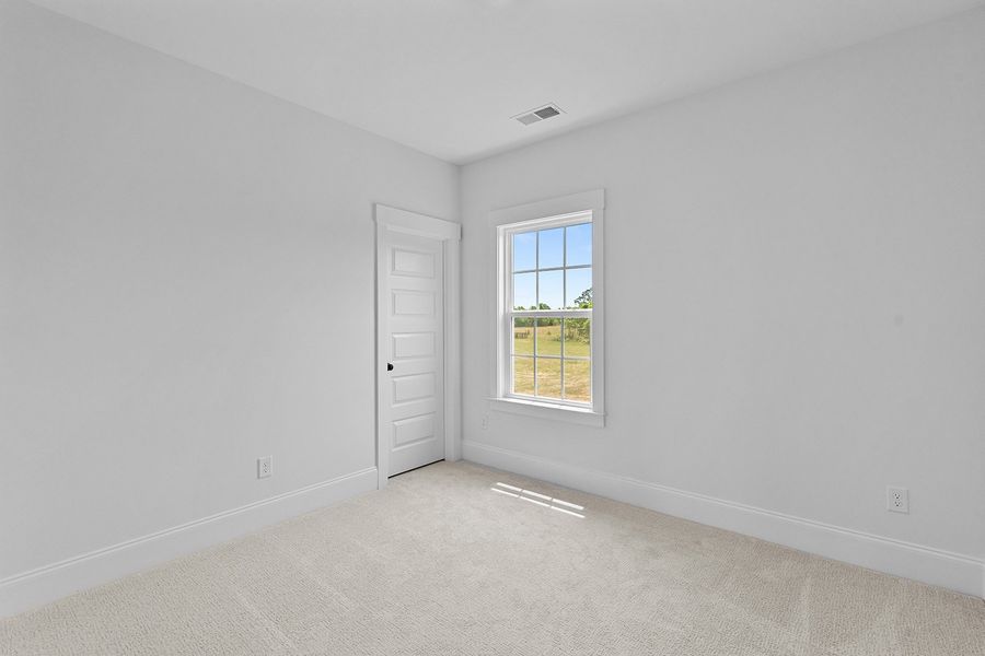Spacious, unfurnished interior of a new home in Lilah Grove, Summerfield (Image 40).