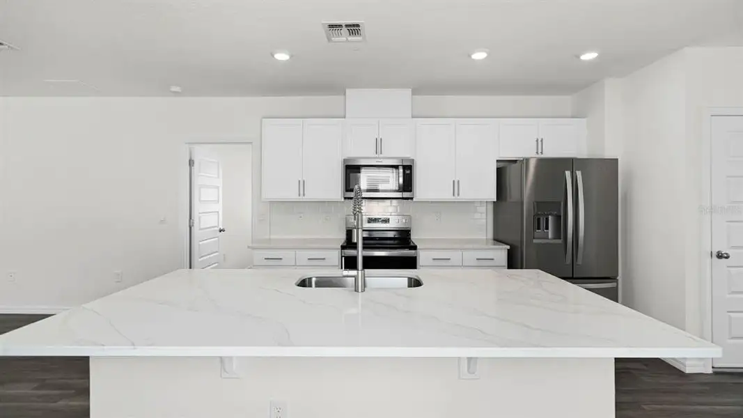 Furnished interior view inside a new home in , Winter Haven (Image 7).