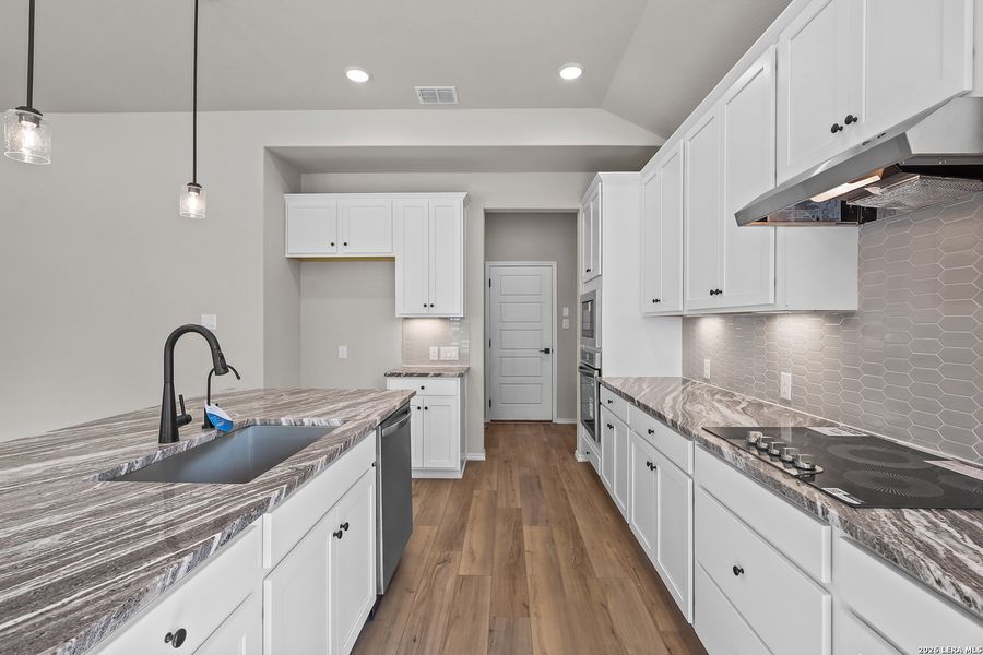 Furnished interior view inside a new home in Royal Crest, San Antonio (Image 14).