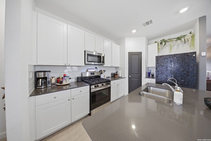 Furnished interior view inside a new home in Sage Meadows, St. Hedwig (Image 21).