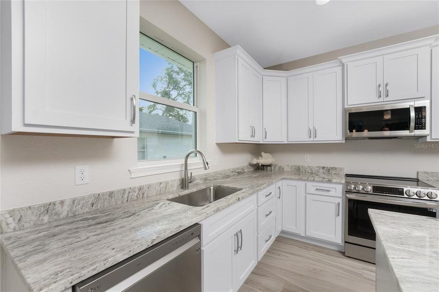 Furnished interior view inside a new home in , Rotonda West (Image 11). Furnished interior view inside a new home in , Rotonda West (Image 11).