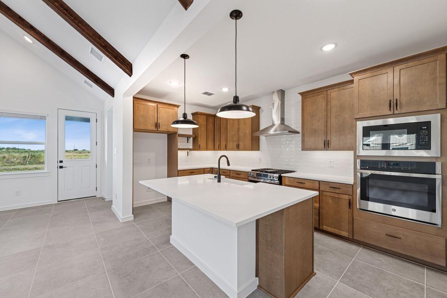 Gourmet island kitchen (*Photo not of actual home and used for illustration purposes only.) Gourmet island kitchen (*Photo not of actual home and used for illustration purposes only.)