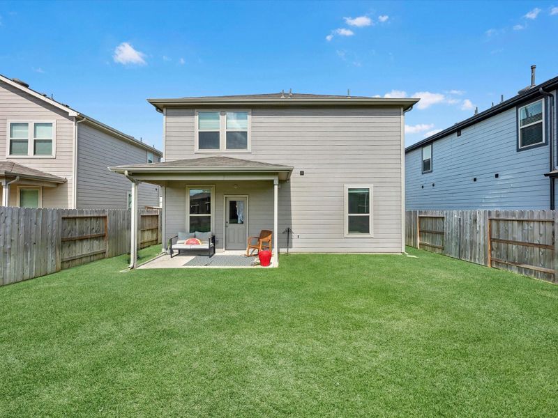 Exterior details and patio area of a home in Mavera, Conroe (Image 21).