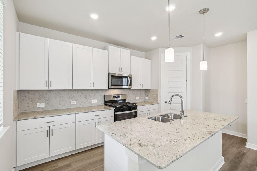 Furnished interior view inside a new home in Spring Brook Village - City Series, Houston (Image 6). Furnished interior view inside a new home in Spring Brook Village - City Series, Houston (Image 6).