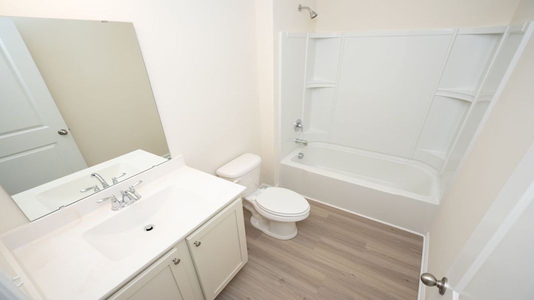 Representative furnished interior of a home built from the CALI by D.R. Horton in Island Green, Myrtle Beach (Image 5).