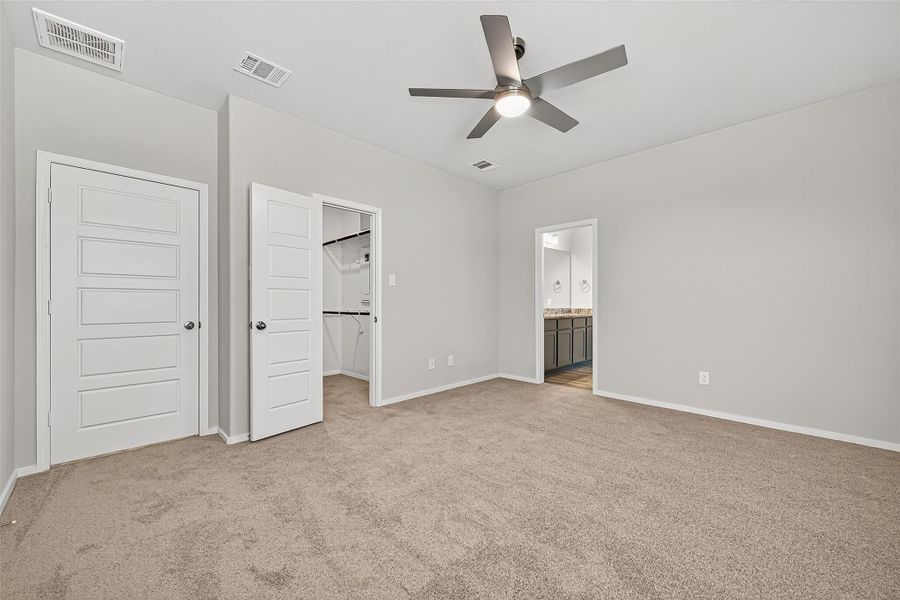 Spacious, unfurnished interior of a new home in Sunterra, Katy (Image 21).