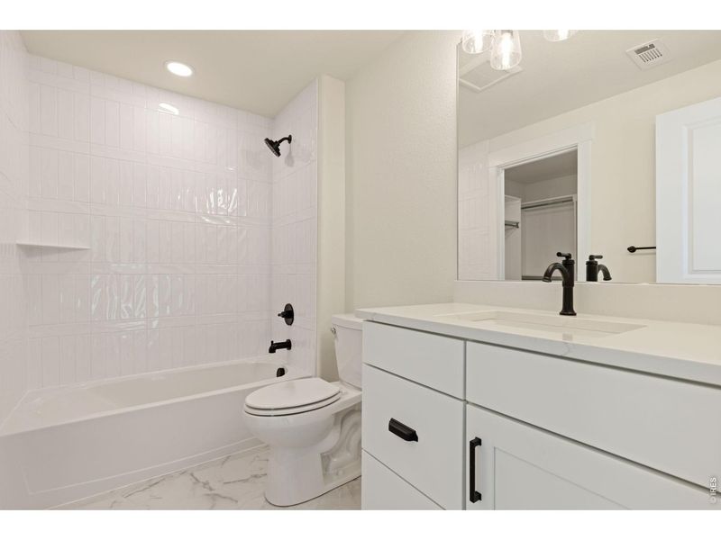 Furnished interior view inside a new home in RainDance, Windsor (Image 5).